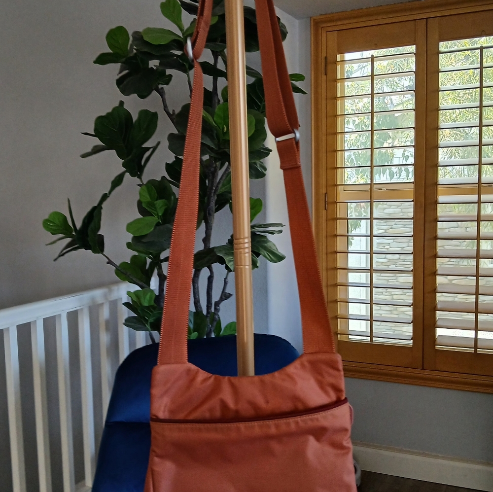 Tumi T-Tech Nylon McKenna Crossbody Bag in Burnt Orange. 5132CND - Picture 3 of 11